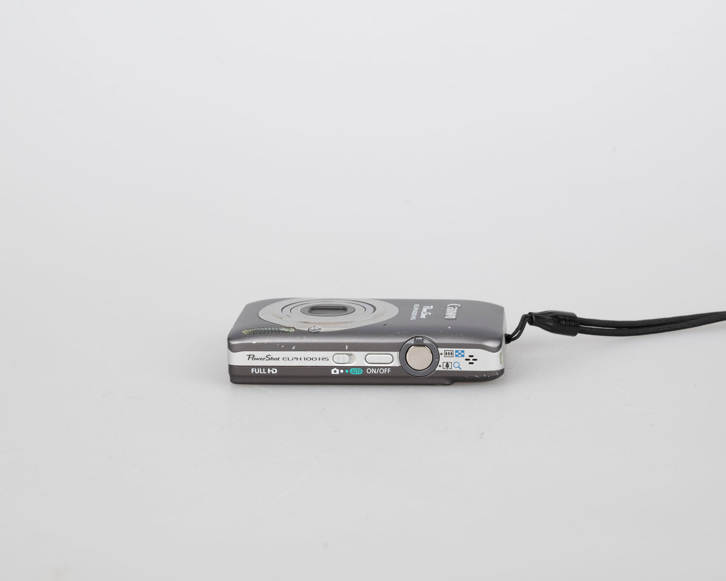 Canon Powershot Digital Elph 100 HS 12.1MP digicam w/ 8GB SD card + battery + charger