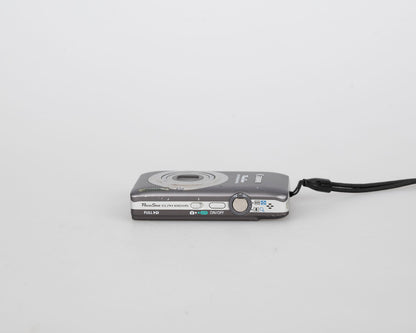 Canon Powershot Digital Elph 100 HS 12.1MP digicam w/ 8GB SD card + battery + charger