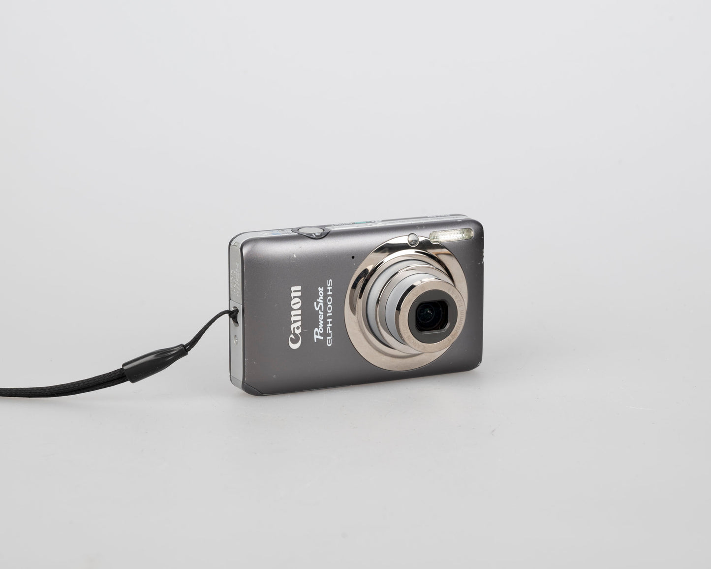Canon Powershot Digital Elph 100 HS 12.1MP digicam w/ 8GB SD card + battery + charger