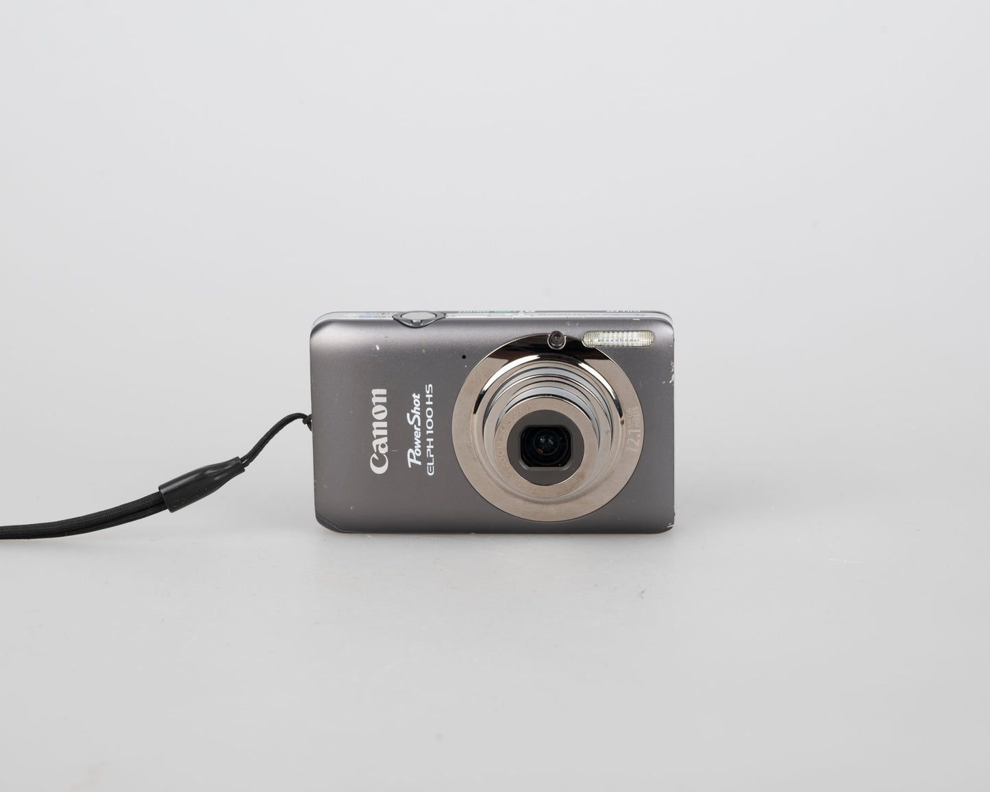 Canon Powershot Digital Elph 100 HS 12.1MP digicam w/ 8GB SD card + battery + charger
