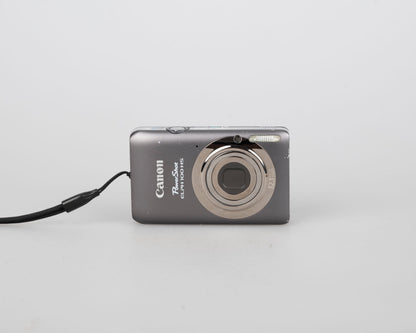 Canon Powershot Digital Elph 100 HS 12.1MP digicam w/ 8GB SD card + battery + charger