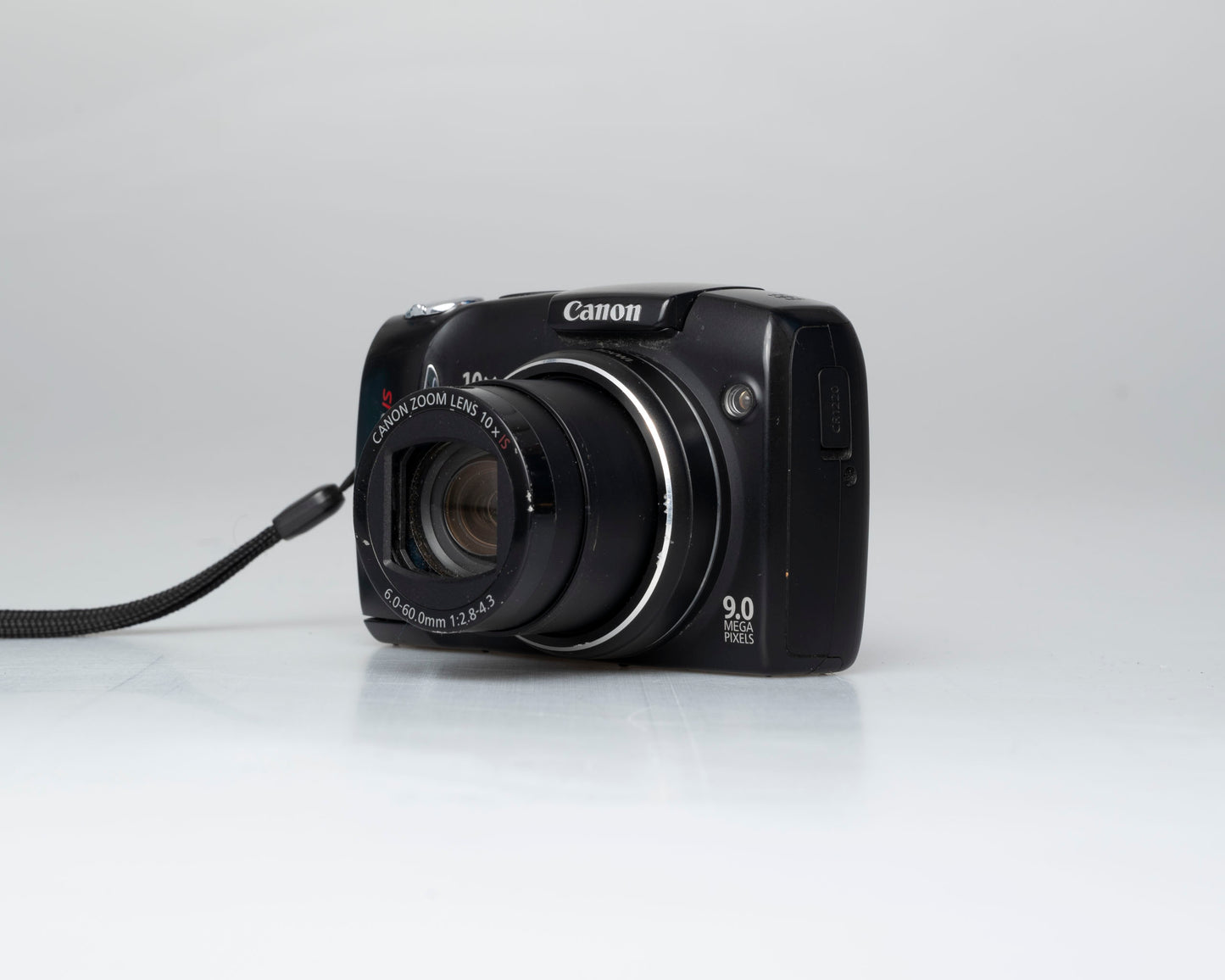 Canon PowerShot SX110 IS 9MP digicam w/ 4GB SD card (serial 855610285)