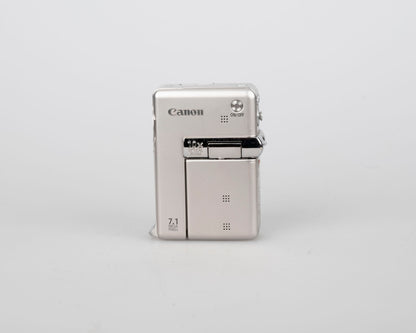 Canon Powershot TX1 digicam w/ 4GB SD card + battery + charger
