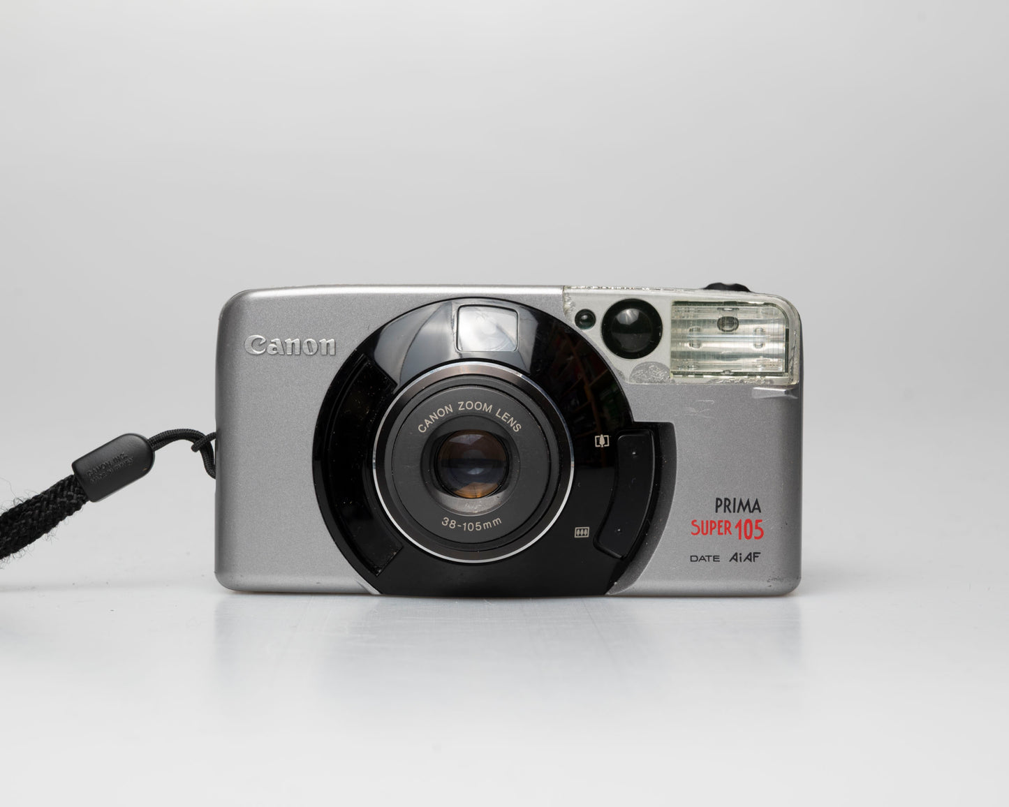 Appareil photo argentique Canon Prima Super 105 Date 35mm avec étui (numéro de série 4421072)