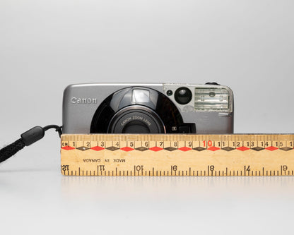 Appareil photo argentique Canon Prima Super 105 Date 35mm avec étui (numéro de série 4421072)
