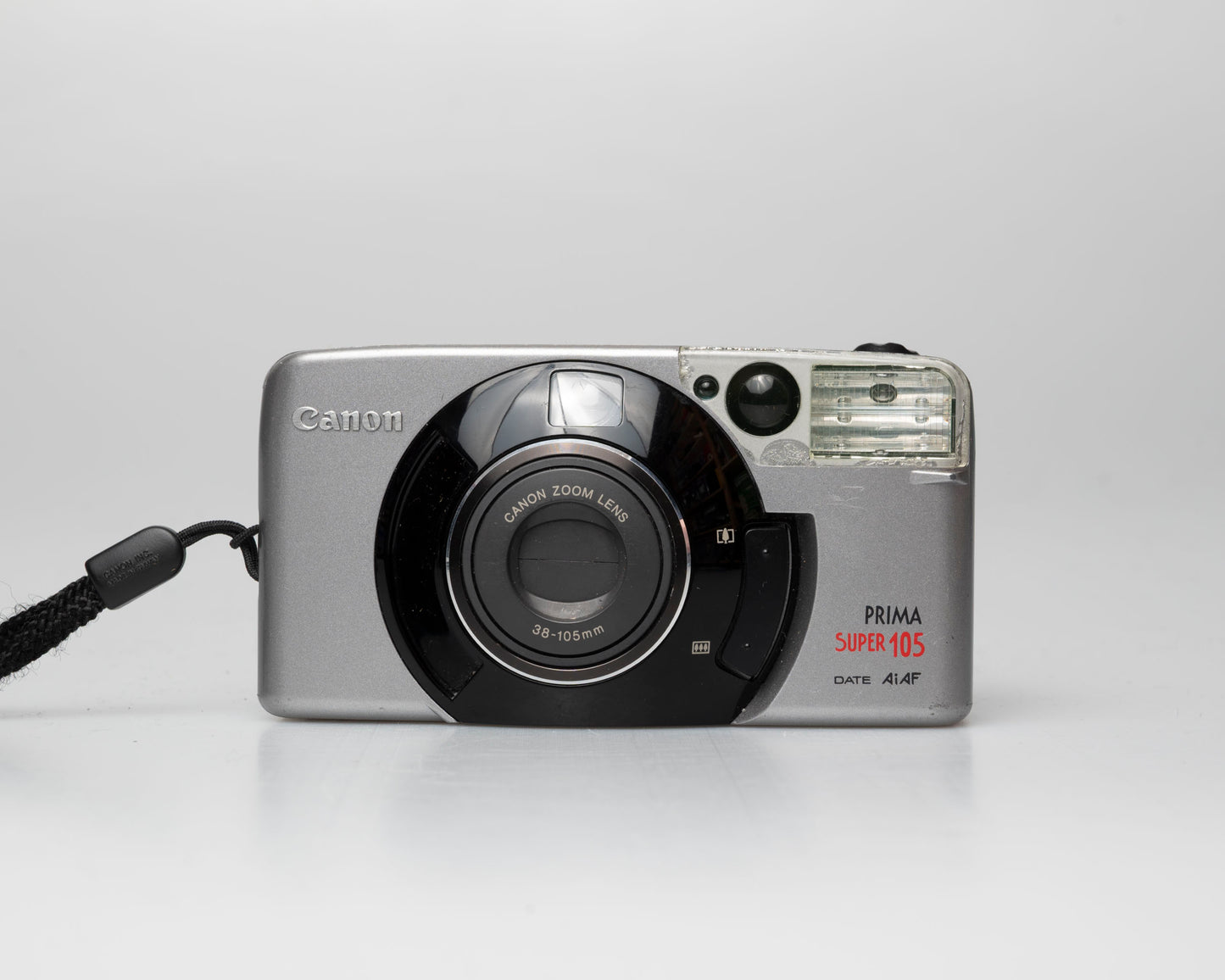Appareil photo argentique Canon Prima Super 105 Date 35mm avec étui (numéro de série 4421072)