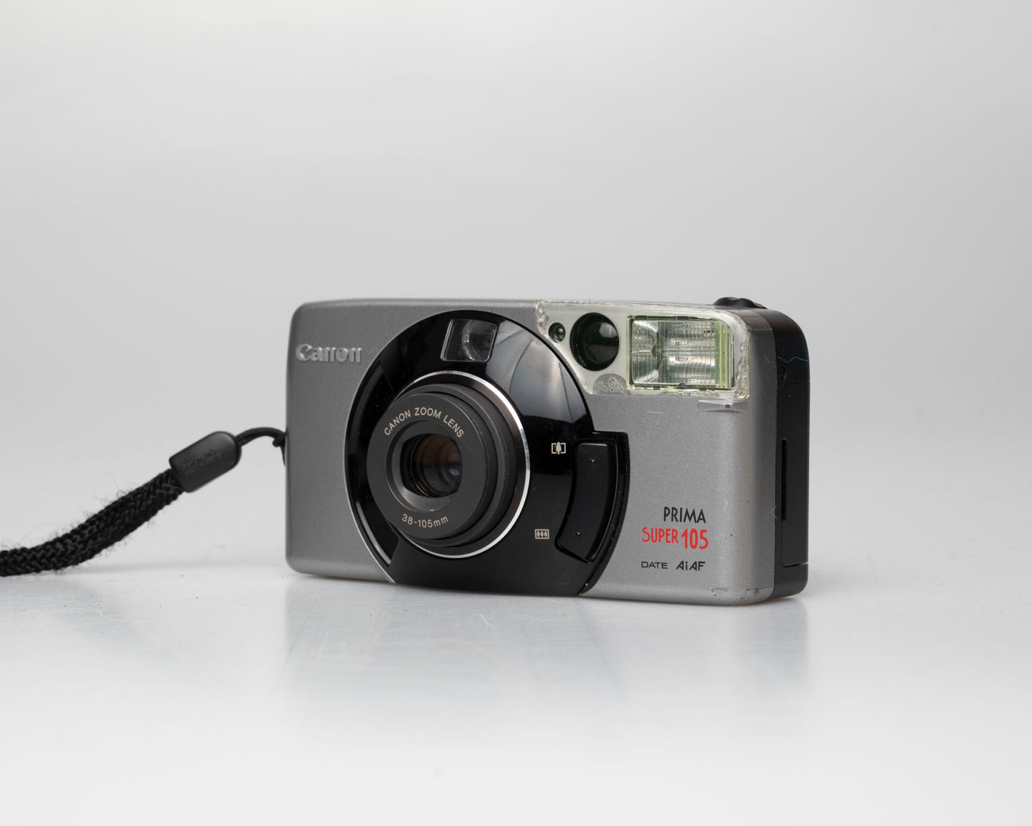Appareil photo argentique Canon Prima Super 105 Date 35mm avec étui (numéro de série 4421072)