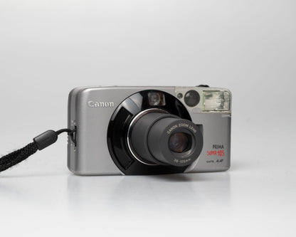 Appareil photo argentique Canon Prima Super 105 Date 35mm avec étui (numéro de série 4421072)