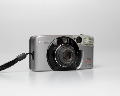 Appareil photo argentique Canon Prima Super 105 Date 35mm avec étui (numéro de série 4421072)