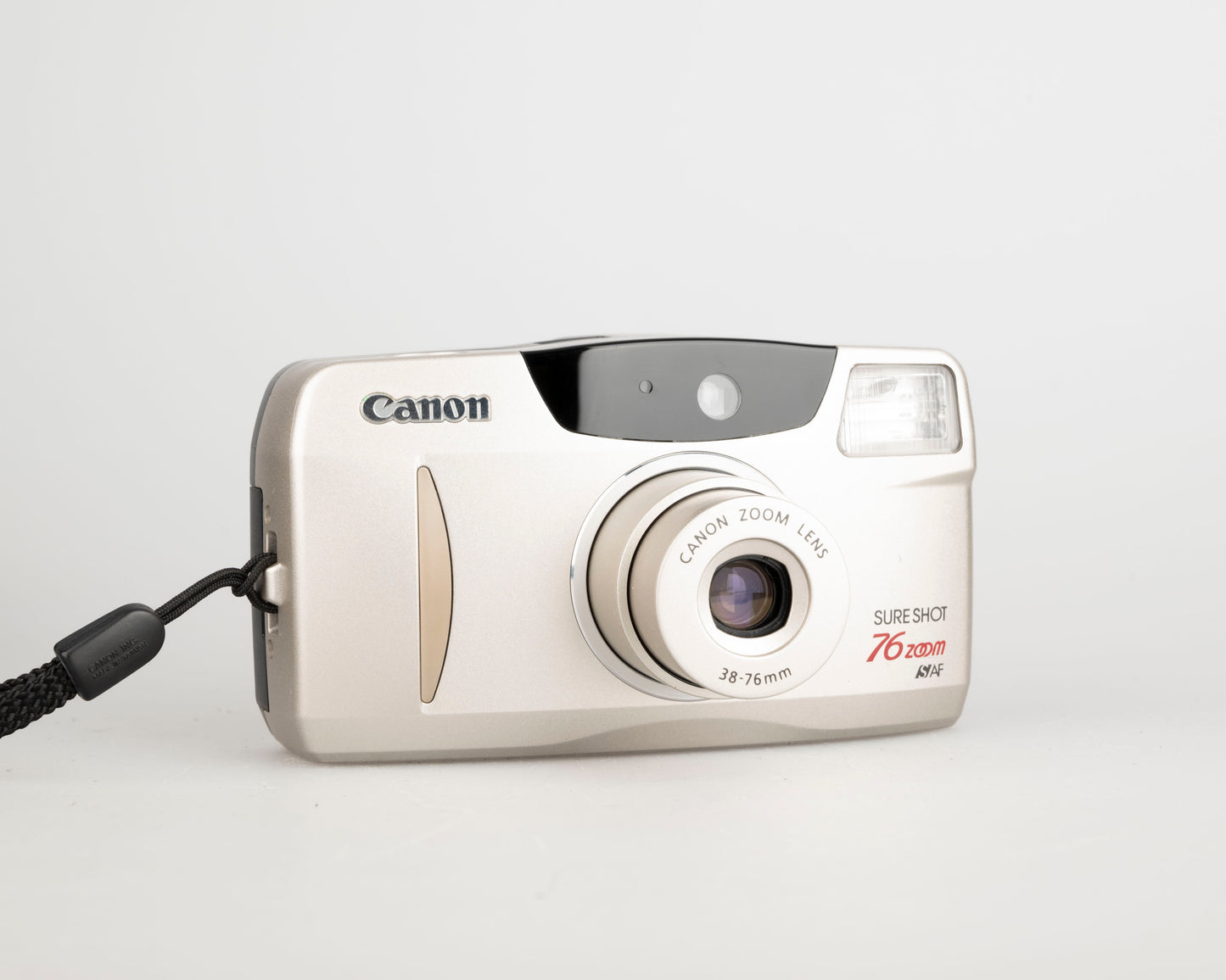 Canon Sure Shot 76 Zoom 35mm film camera w/ case + manual (serial 4663807)
