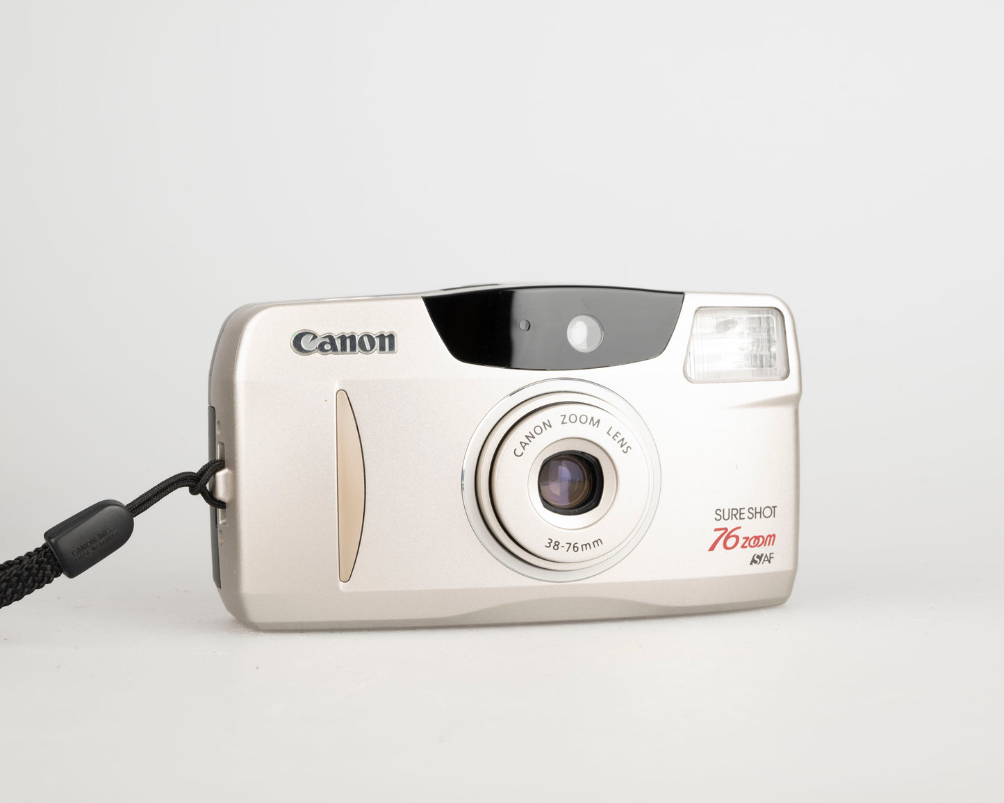 Canon Sure Shot 76 Zoom 35mm film camera w/ case + manual (serial 4663807)
