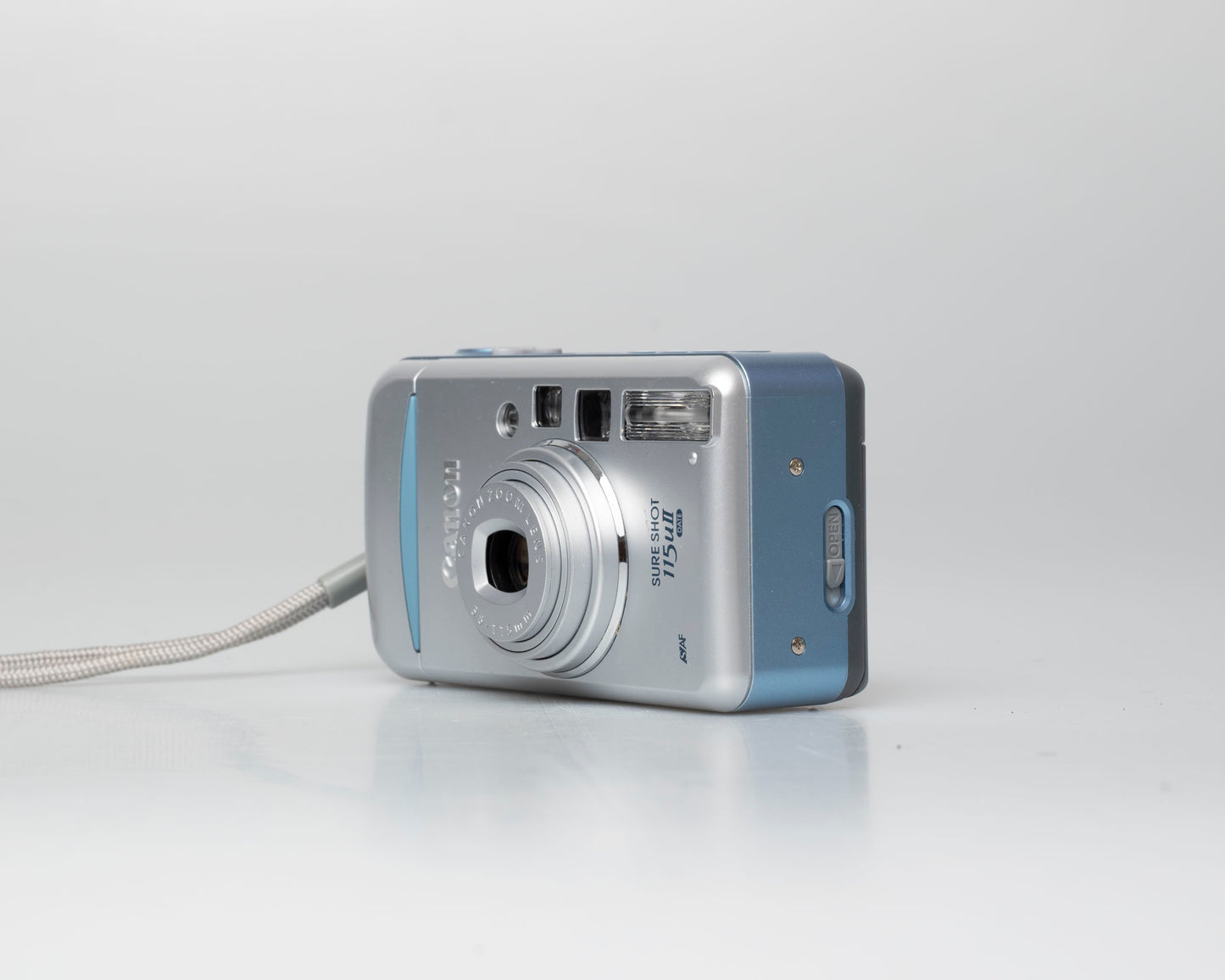 Canon Sure Shot 115u II Date 35mm camera w/ case (serial 1005159)