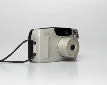 Canon Sure Shot 60 Zoom 35mm point-and-shoot camera; left angle zoomed out