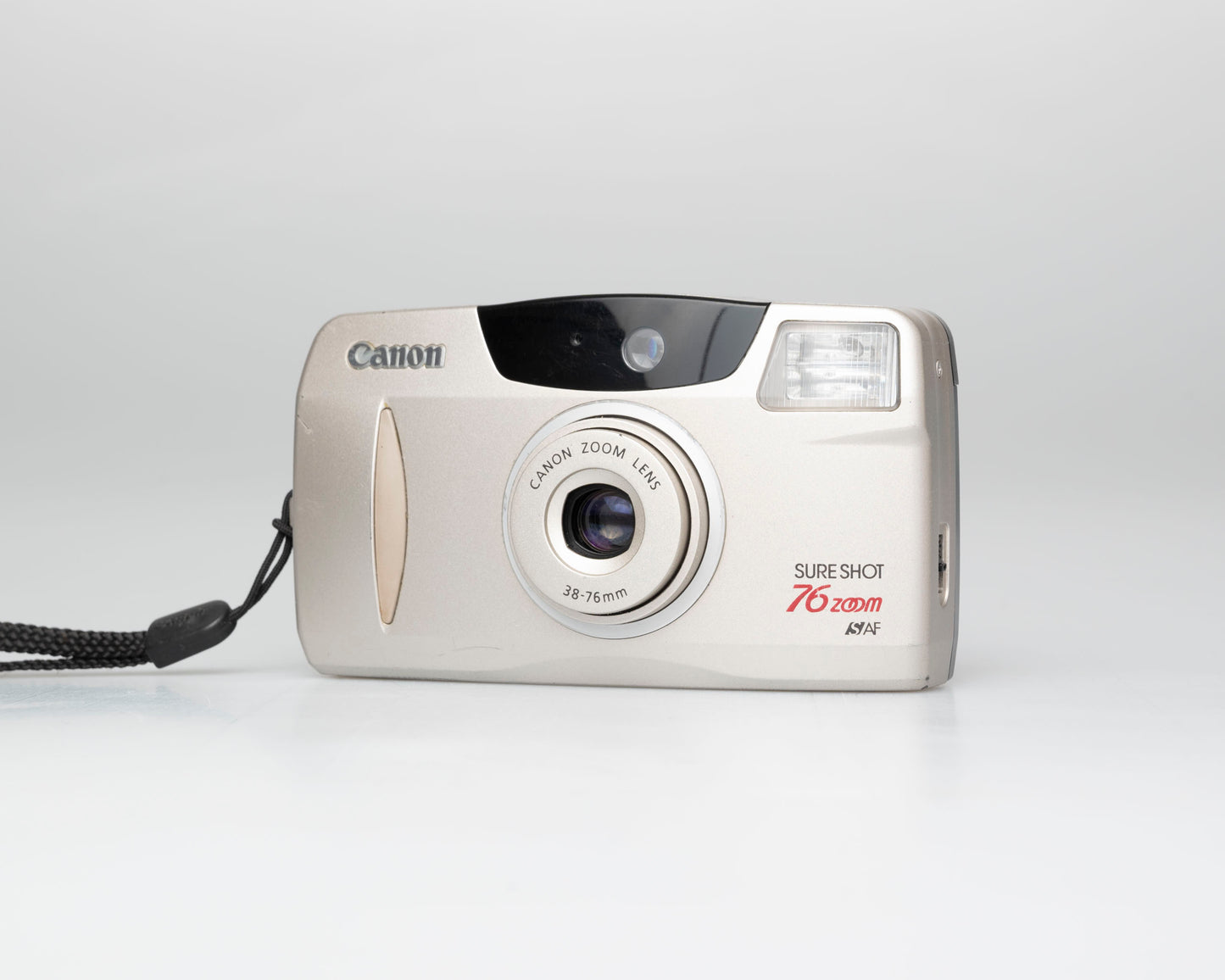 Canon Sure Shot Zoom 76 35mm film camera (serial 5955079)
