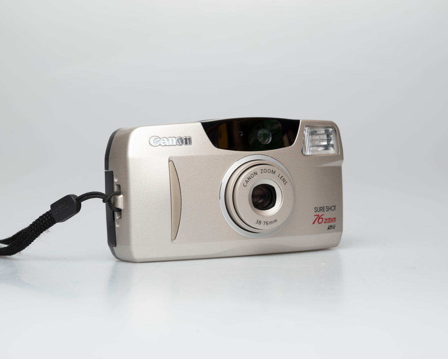 Canon Sure Shot 76 Zoom 35mm film camera w/ case (serial 6300674)
