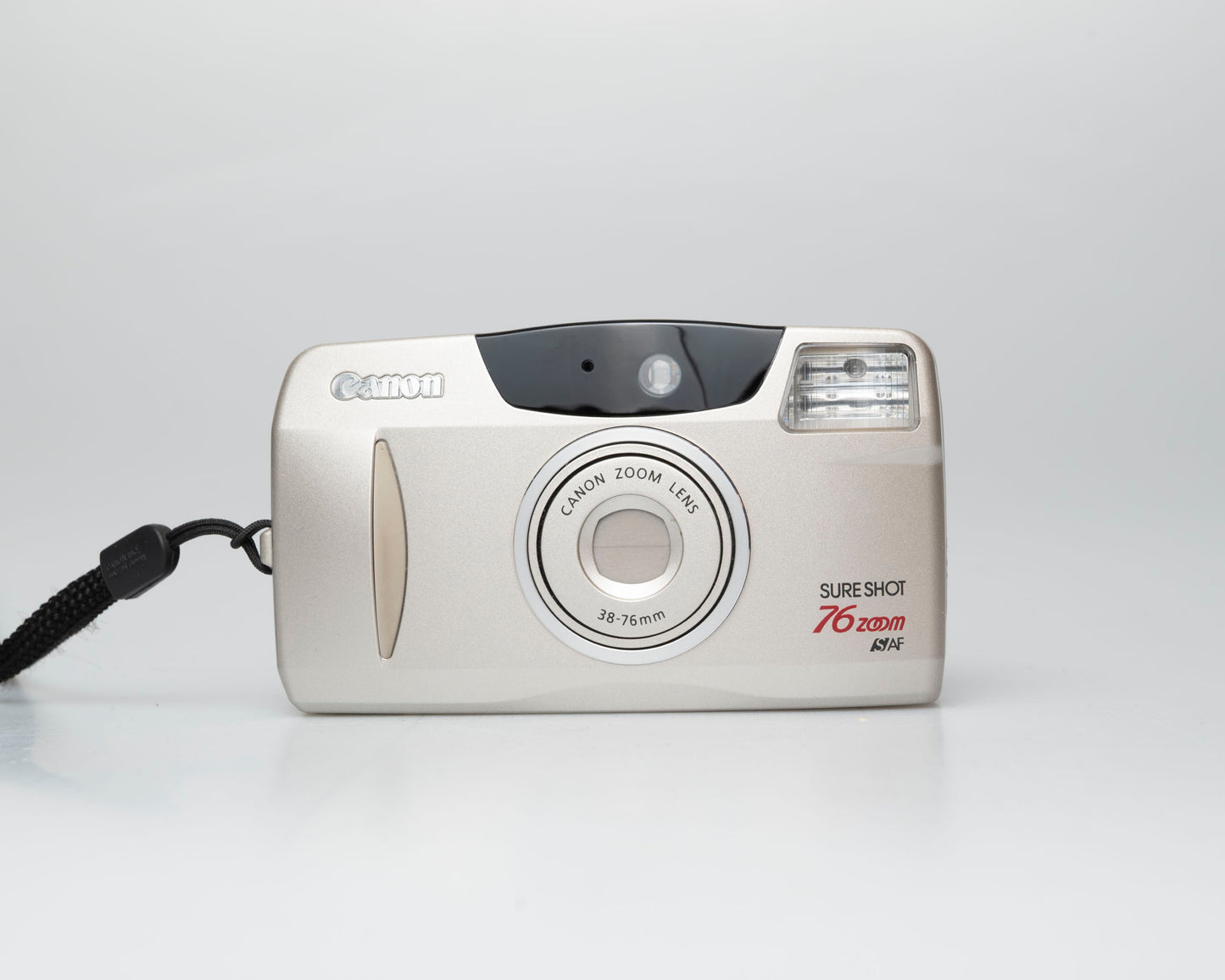 Canon Sure Shot 76 Zoom 35mm film camera w/ case (serial 6300674)