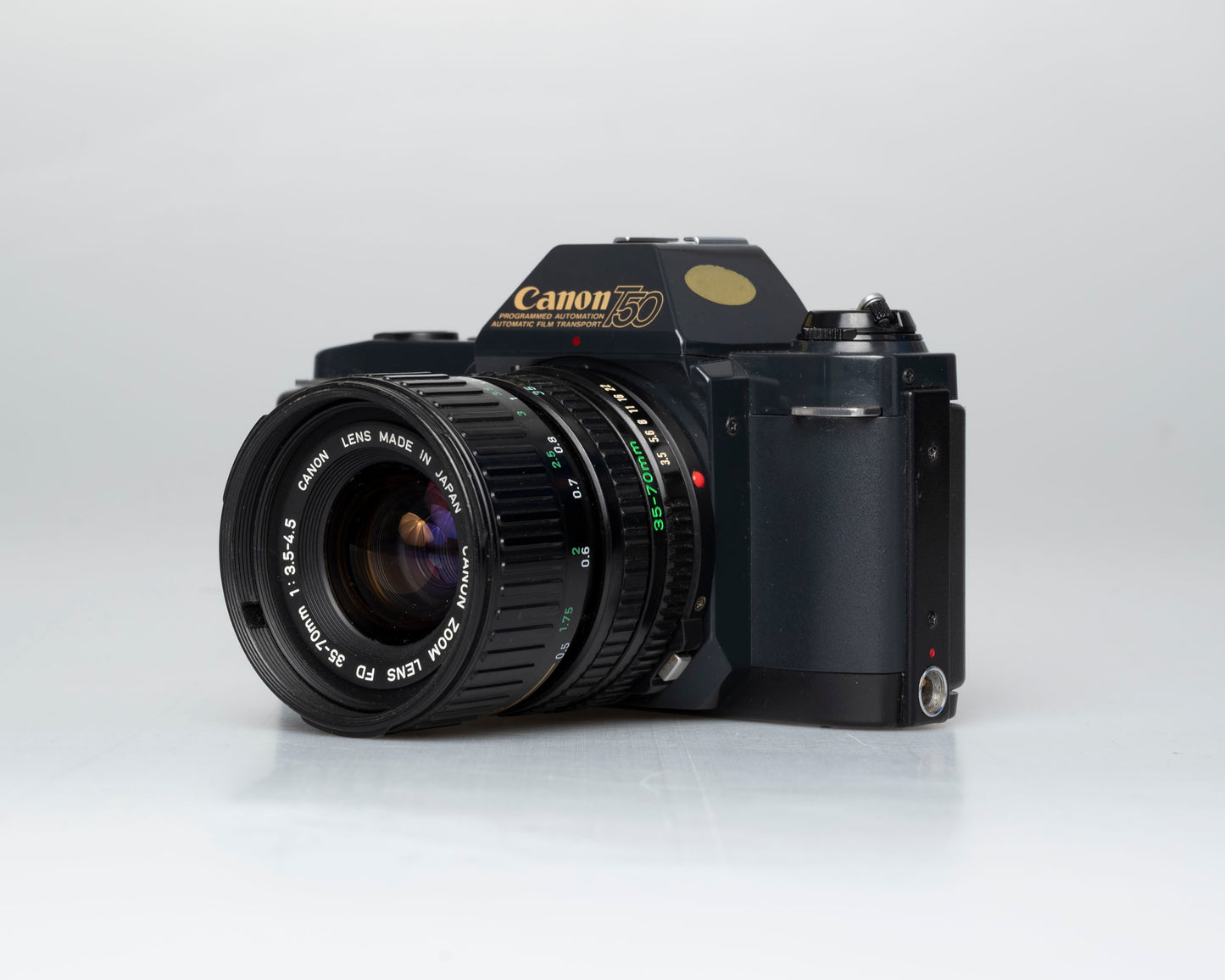 Appareil photo reflex Canon T50 35 mm avec objectif FD 35-70 mm + étui (série 1992261)