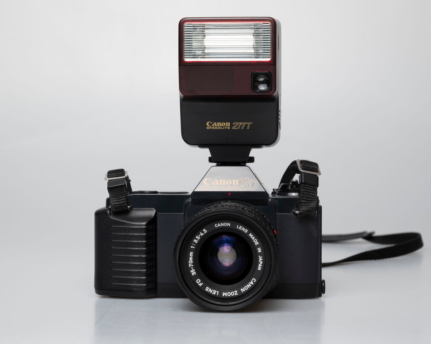 Canon T50 appareil photo reflex 35mm avec objectif FD 35-70mm + flash Speedlite 277T + étui toujours prêt (série 1061065)