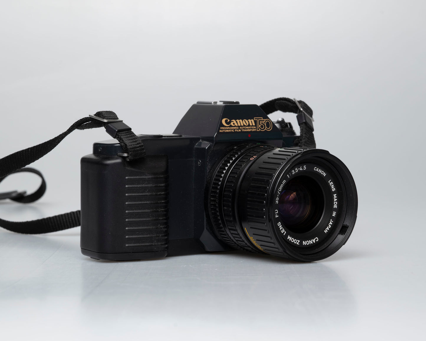 Canon T50 appareil photo reflex 35mm avec objectif FD 35-70mm + flash Speedlite 277T + étui toujours prêt (série 1061065)