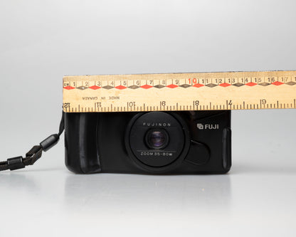 Fuji DL-1000 (aka Discovery 1000 Zoom) 35mm point-and-shoot; front; on; ruler for scale
