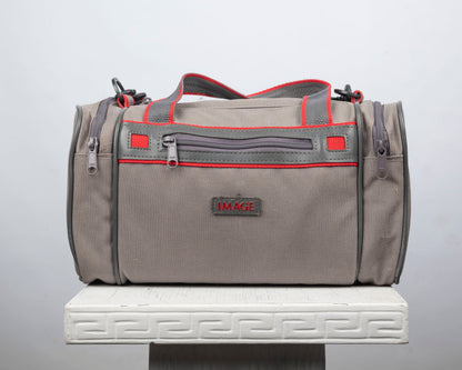 Image mid-sized grey and red camera bag