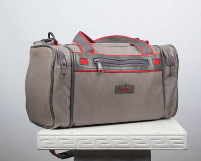 Image mid-sized grey and red camera bag