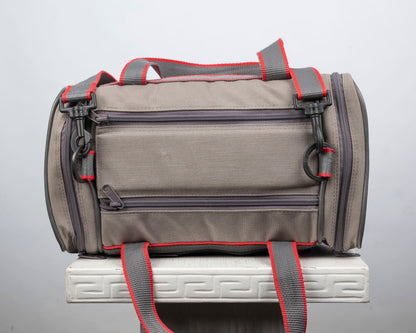 Image mid-sized grey and red camera bag