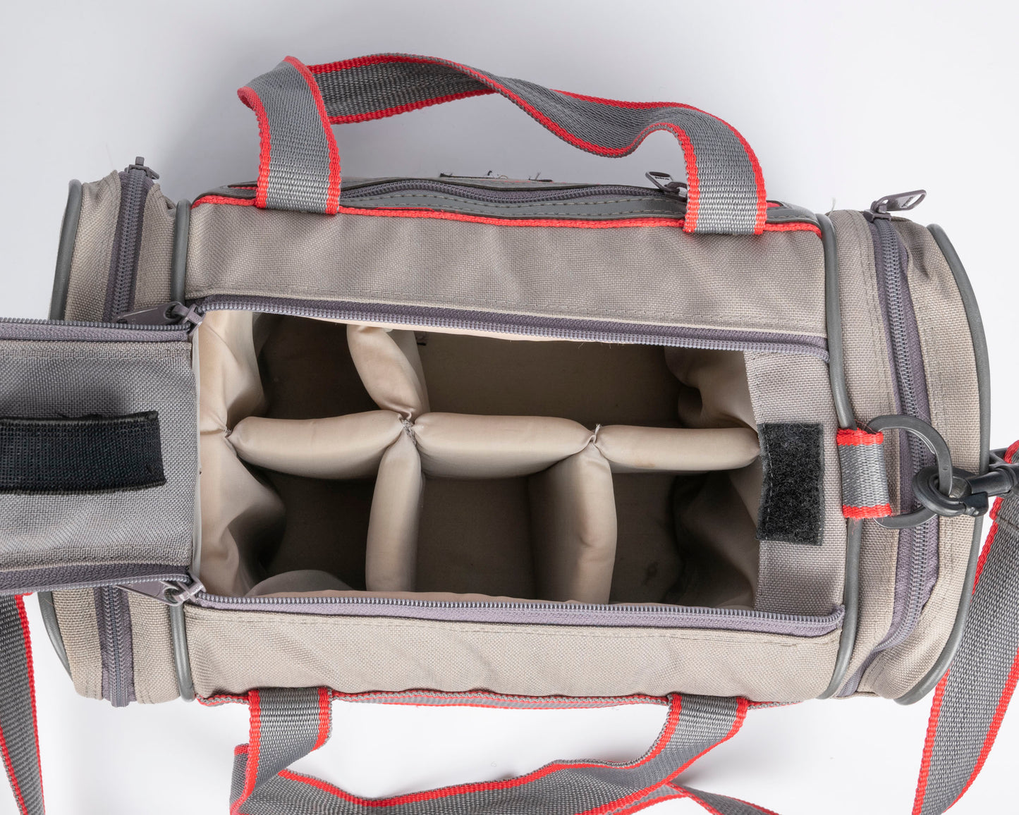 Image mid-sized grey and red camera bag