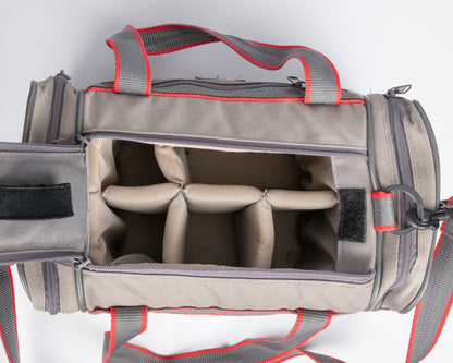 Image mid-sized grey and red camera bag