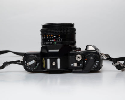 Konica TC-X appareil photo reflex 35mm avec objectif Hexanon AR 50mm f1.8 + manuel (numéro de série 268882)