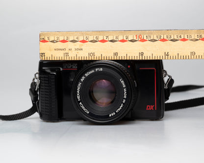 Konica TC-X appareil photo reflex 35mm avec objectif Hexanon AR 50mm f1.8 + manuel (numéro de série 268882)
