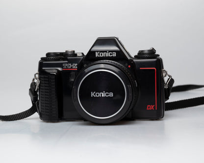 Konica TC-X appareil photo reflex 35mm avec objectif Hexanon AR 50mm f1.8 + manuel (numéro de série 268882)