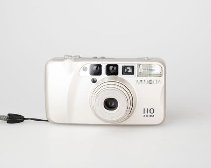 Minolta 110 Zoom ultra compact 35mm camera w/ case (serial 34332652)