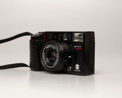 Appareil photo argentique à mise au point automatique Minolta AF Tele à double objectif 35mm avec boîte (numéro de série 58114422)