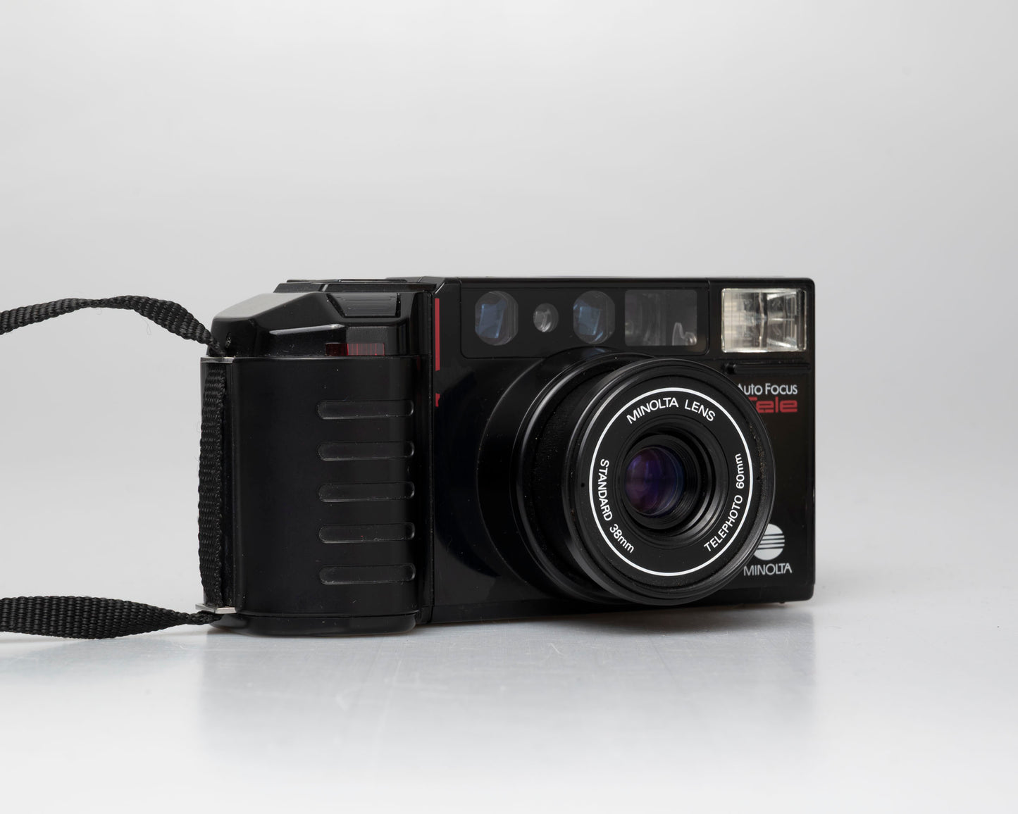 Appareil photo argentique à mise au point automatique Minolta AF Tele à double objectif 35mm avec boîte (numéro de série 58114422)