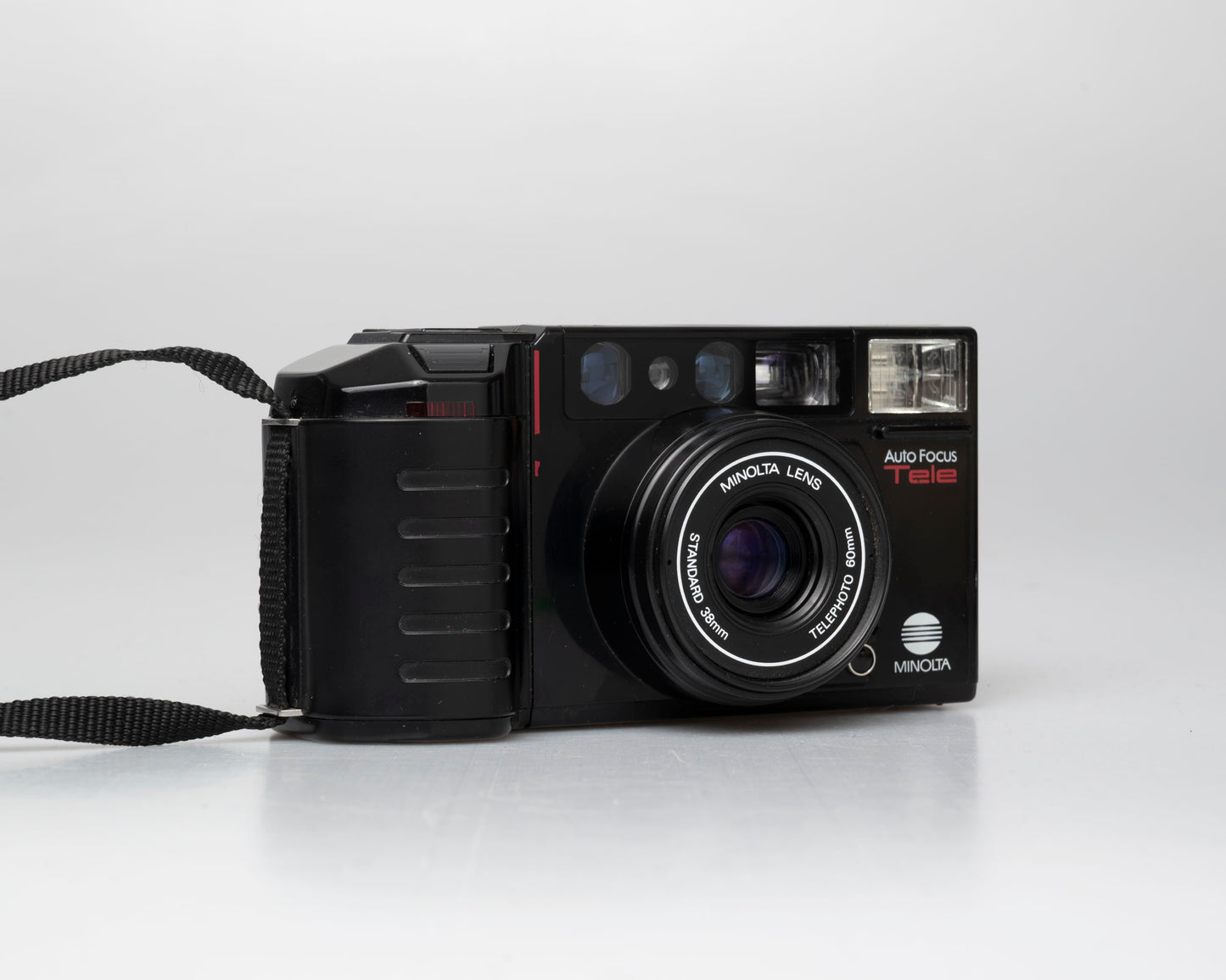 Appareil photo argentique à mise au point automatique Minolta AF Tele à double objectif 35mm avec boîte (numéro de série 58114422)