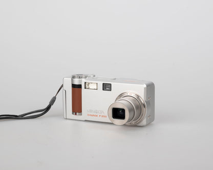 Minolta DiMage F200 4 MP CCD sensor digicam w/ 256MB SD + original box + manuals (uses AA batteries)
