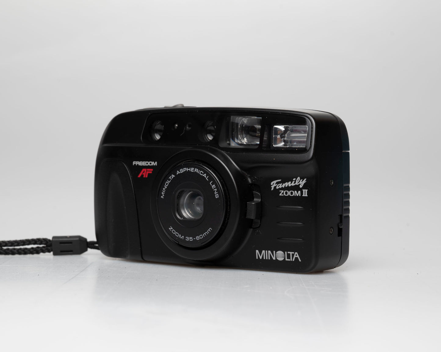 Appareil photo Minolta Family Zoom II 35mm avec étui (numéro de série 41974429)