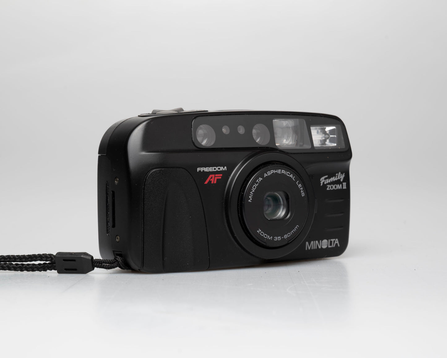 Appareil photo Minolta Family Zoom II 35mm avec étui (numéro de série 41974429)