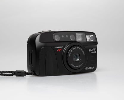 Appareil photo Minolta Family Zoom II 35mm avec étui (numéro de série 41974429)