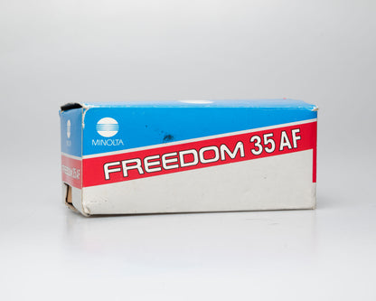 Minolta Freedom 35AF 35mm point-and-shoot camera w/ box, case, and manual (serial 19401562)