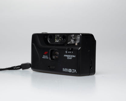 Minolta Freedom 35AF 35mm point-and-shoot camera w/ box, case, and manual (serial 19401562)