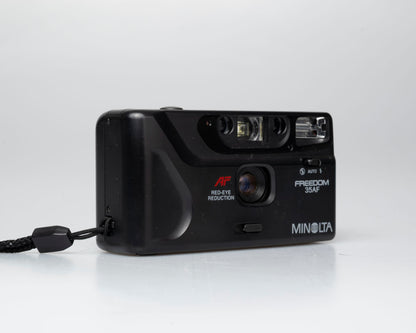 Minolta Freedom 35AF 35mm point-and-shoot camera w/ box, case, and manual (serial 19401562)