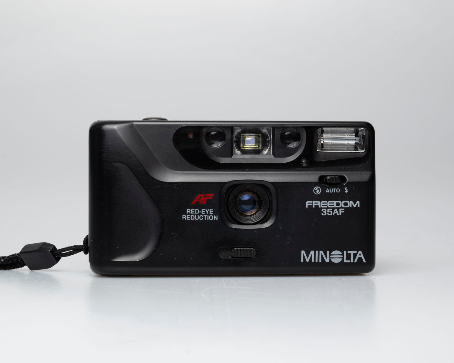 Minolta Freedom 35AF 35mm point-and-shoot camera w/ box, case, and manual (serial 19401562)
