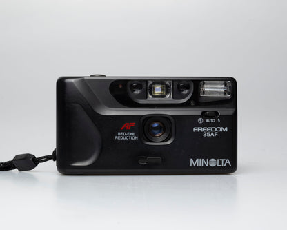 Minolta Freedom 35AF 35mm point-and-shoot camera w/ box, case, and manual (serial 19401562)