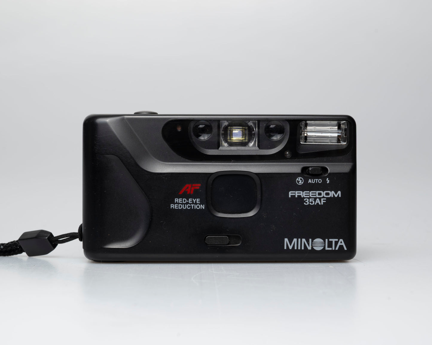 Minolta Freedom 35AF 35mm point-and-shoot camera w/ box, case, and manual (serial 19401562)