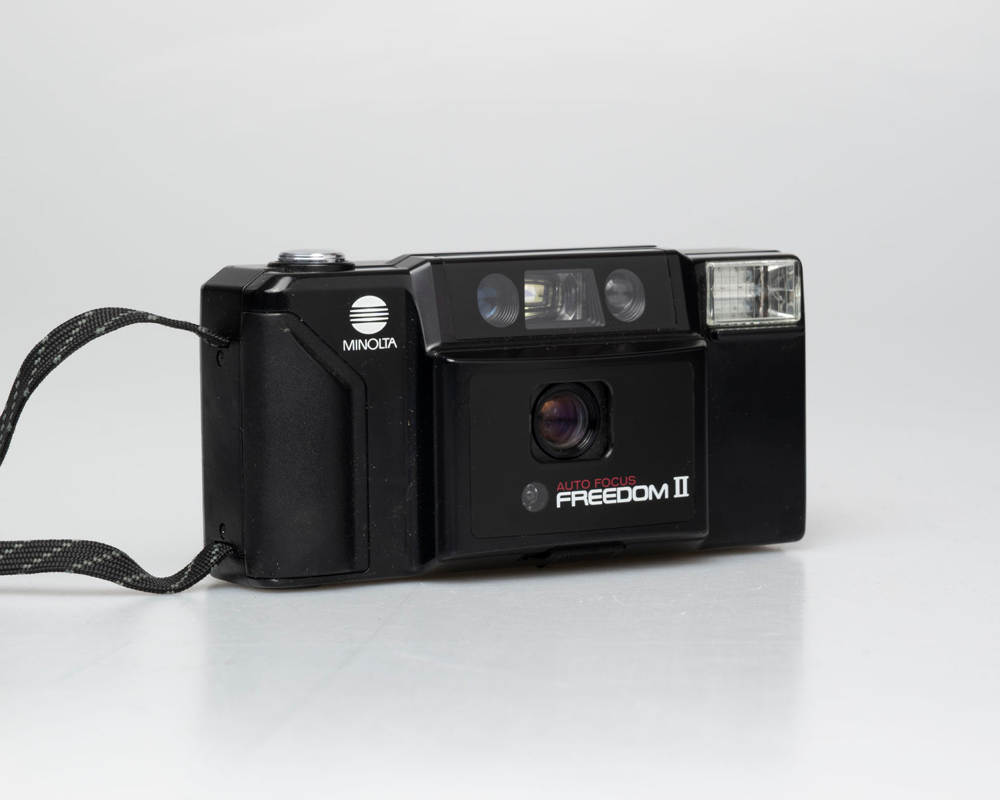 Minolta Freedom II Auto-focus 35mm camera w/ case (serial 3417595)