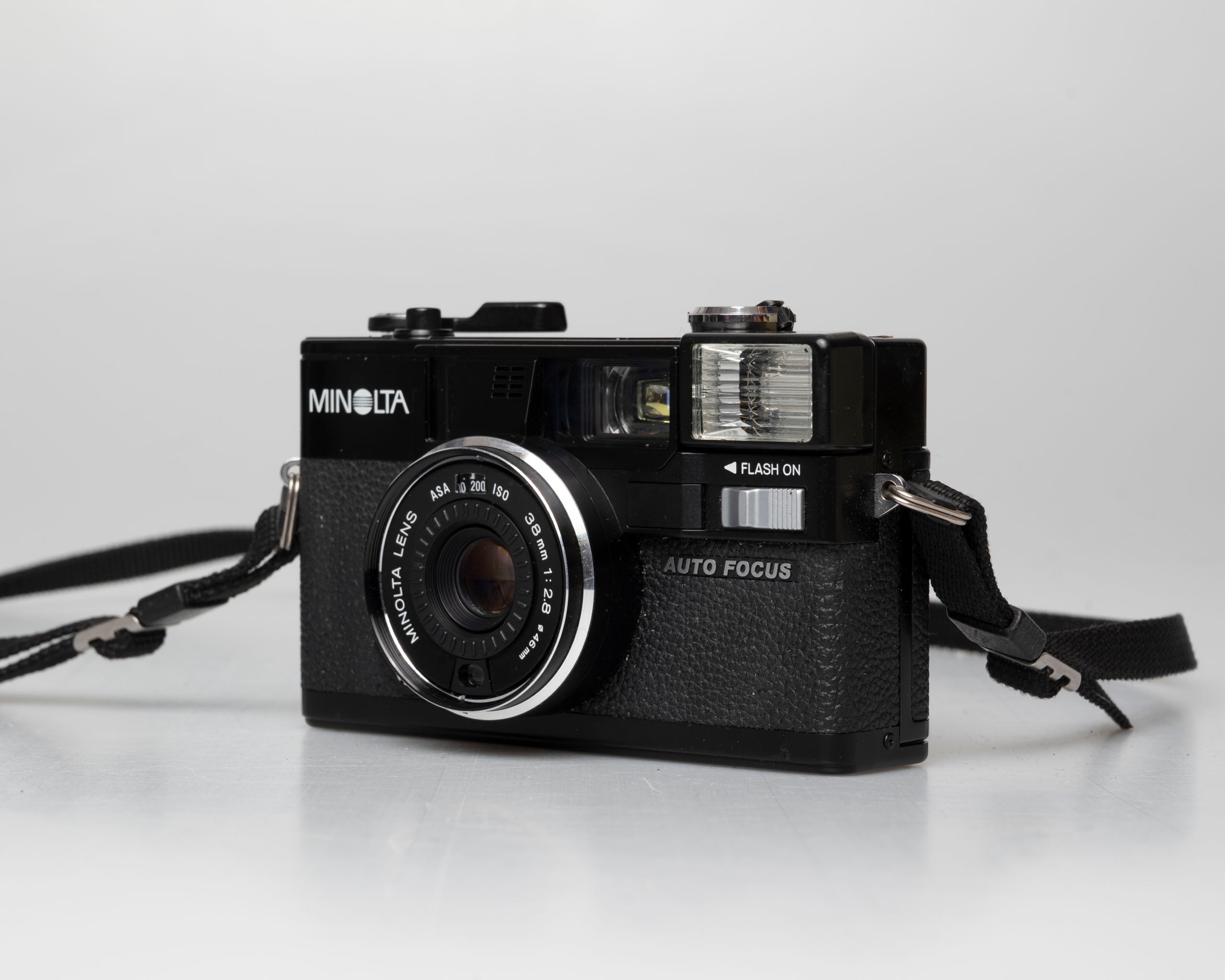 Minolta Hi-Matic AF2 35mm camera w/ box, case, & manual (serial