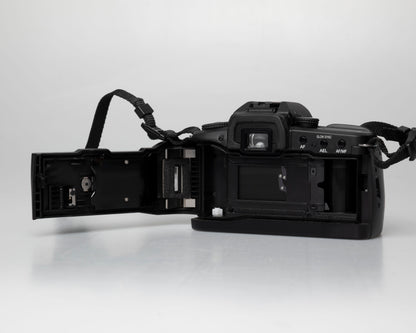 Minolta Maxxum 70 35mm film camera with 50mm f1.7 lens; back view with film door open