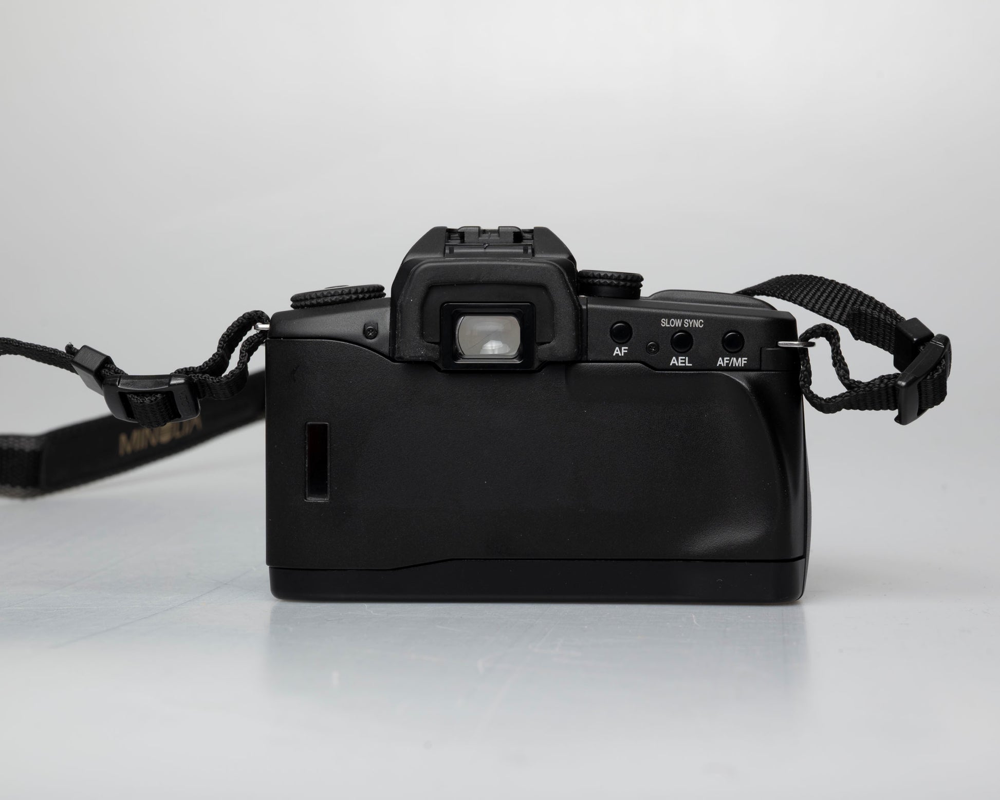 Minolta Maxxum 70 35mm film camera with 50mm f1.7 lens; back view